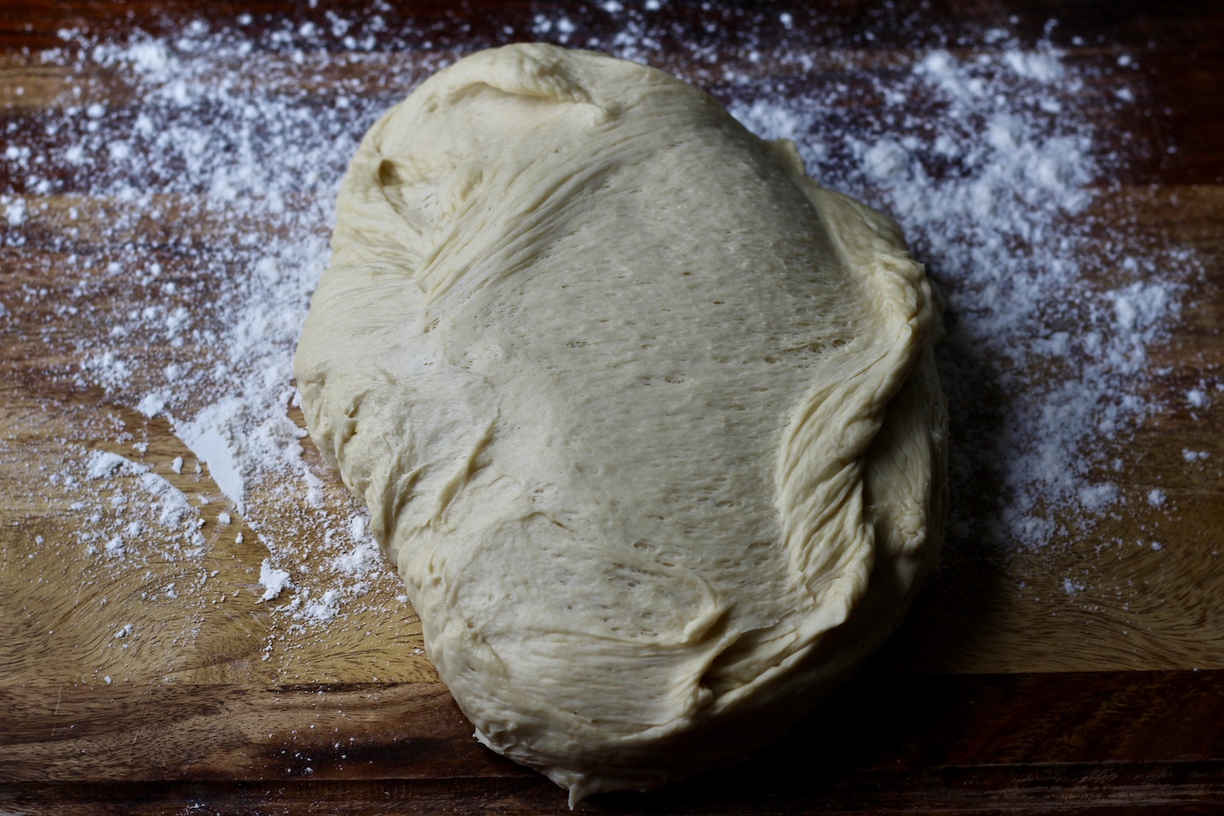 Raw garlic knot dough before being divided into equal pieces.