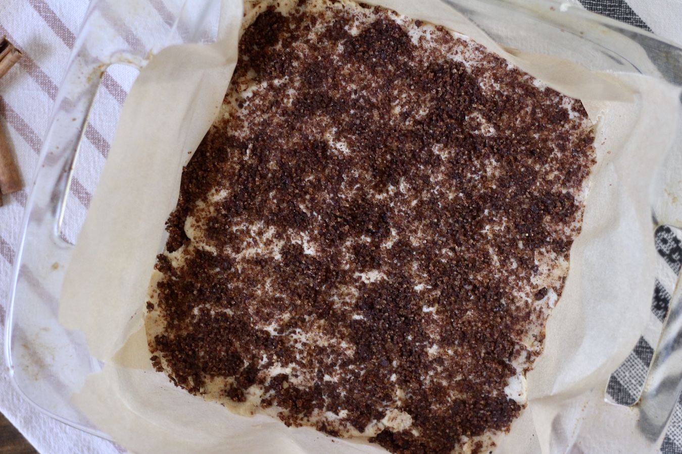 Cinnamon sugar mix pressed into the top of the cookie bars after baking.