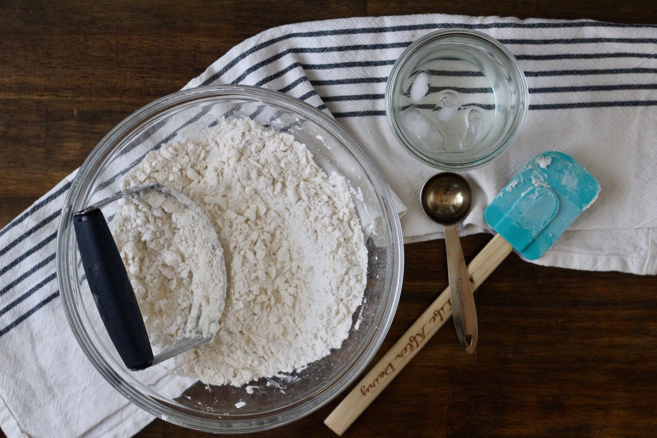 Flour with crisco cut in and water to the side.
