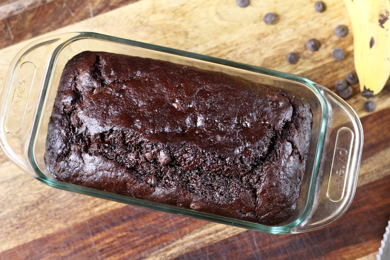 Baked banana bread in a loaf pan.