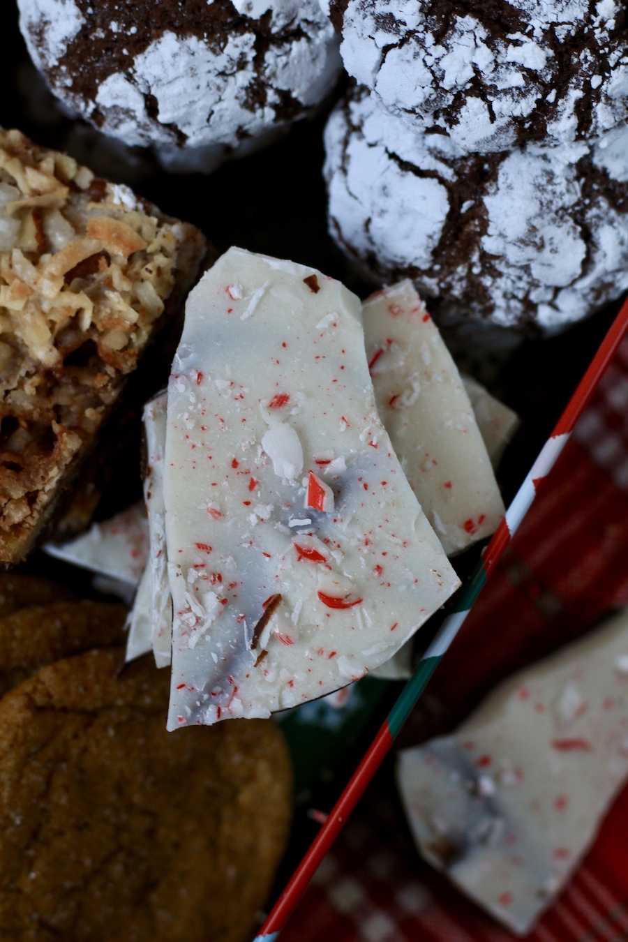 Peppermint bark inside a holiday cookie box.