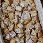 A close up shot of sugar coated vanilla bread pudding.
