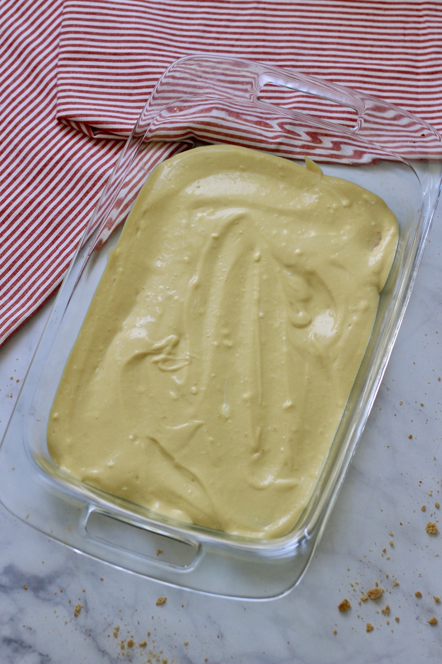 The first layer of pudding mixture on top.