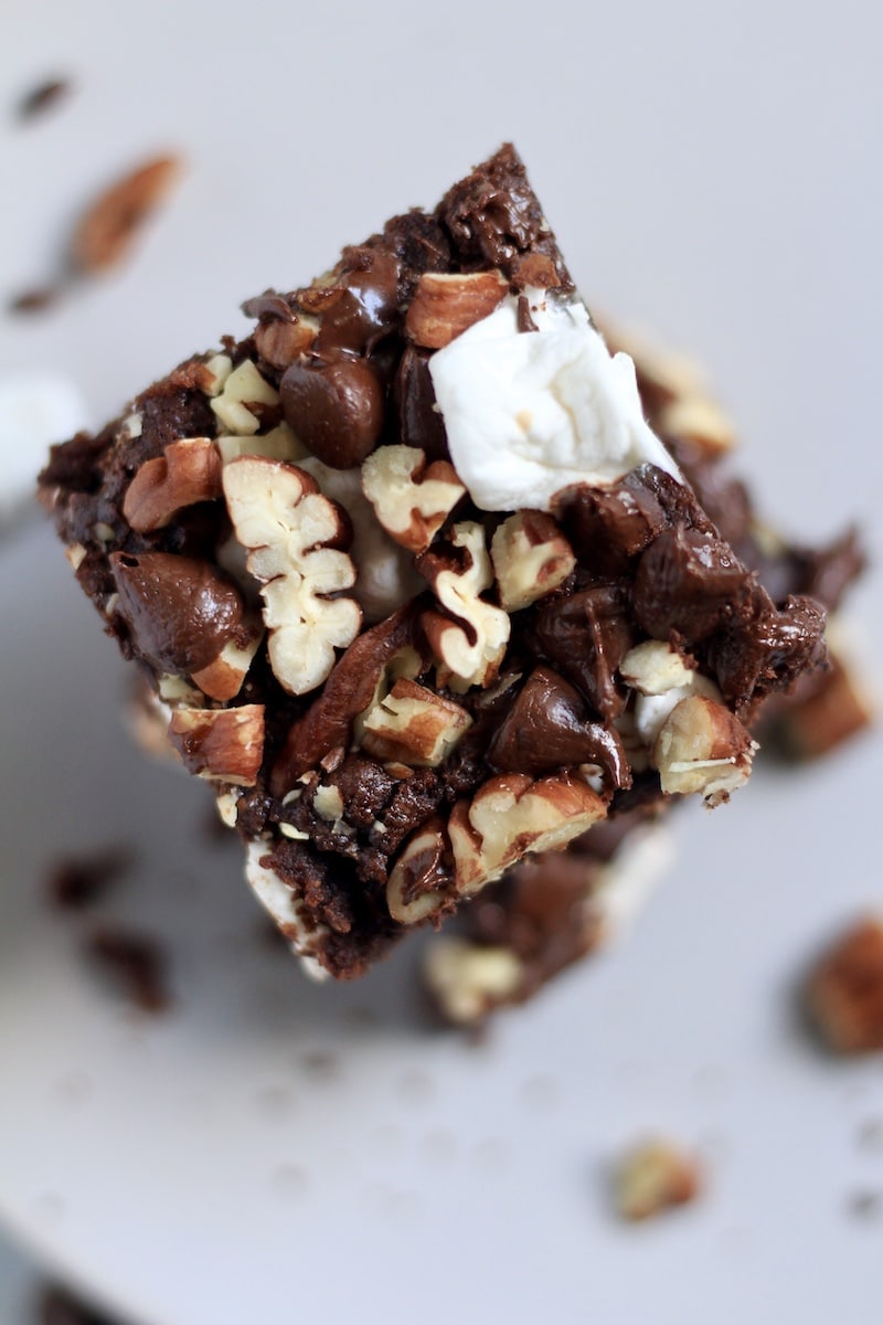 The top of a vegan rocky road brownie on a stack of other brownies.