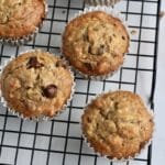 A square top down photo of chunky monkey muffins on a cooling rack.