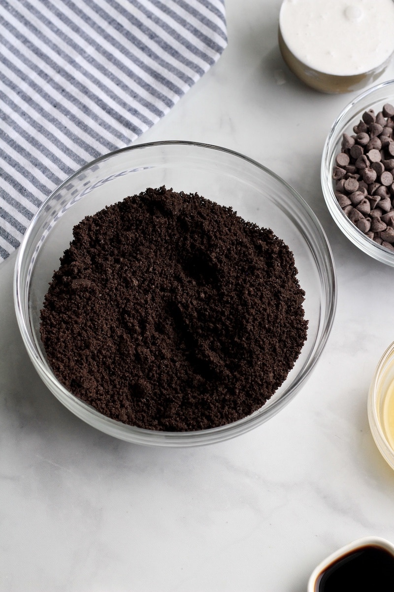 Crushed Oreo before being mixed into no-bake chocolate tart pans.