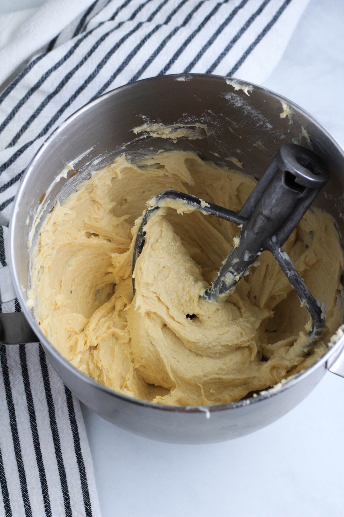 A mixing bowl with vanilla pound cake.