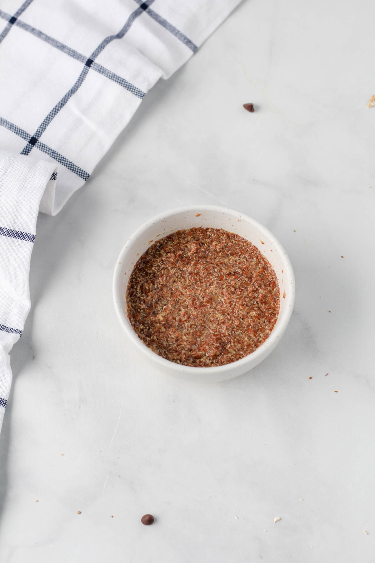 A small mixing bowl with flax and water mixed together.