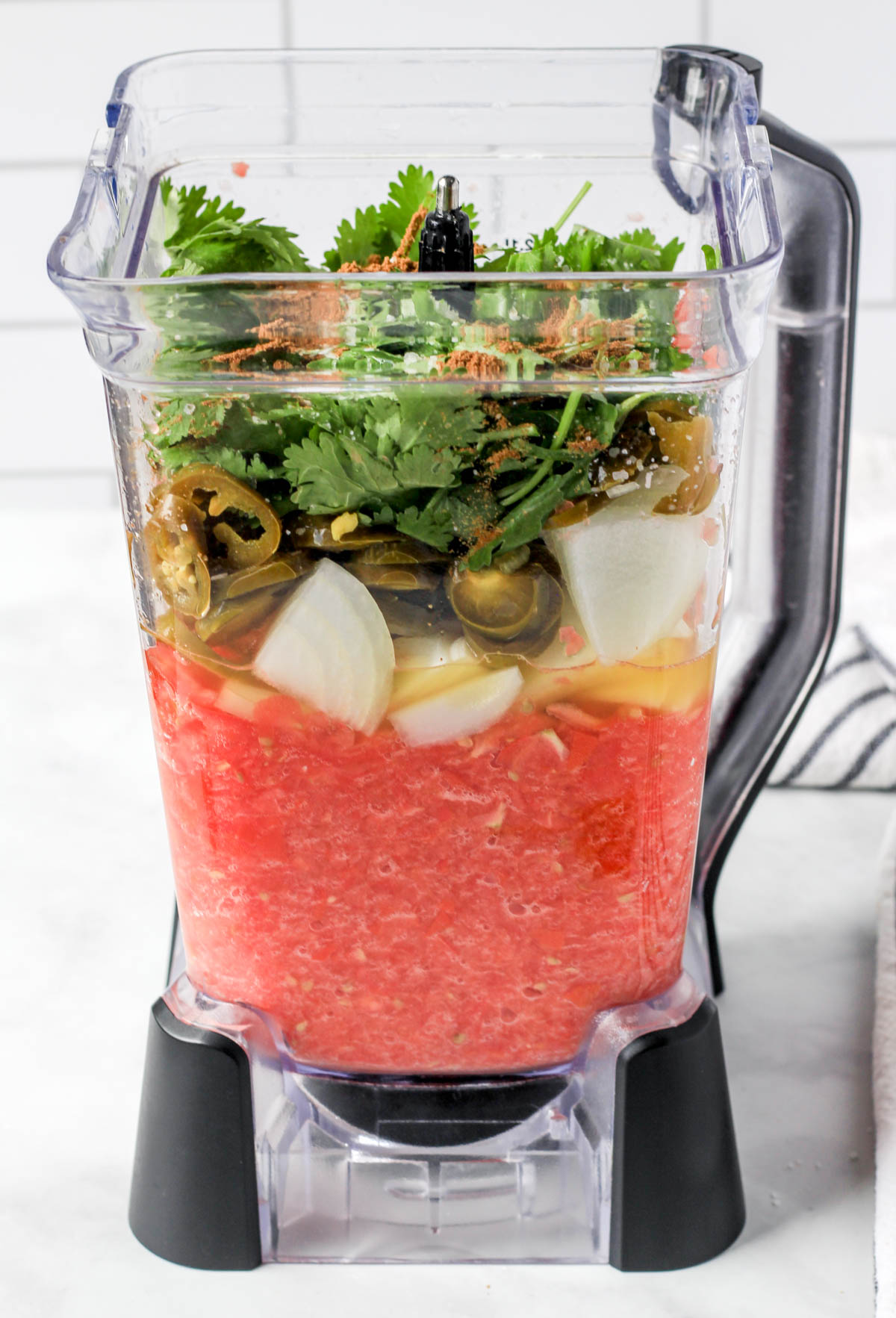 The ingredients for blender salsa before blending together.