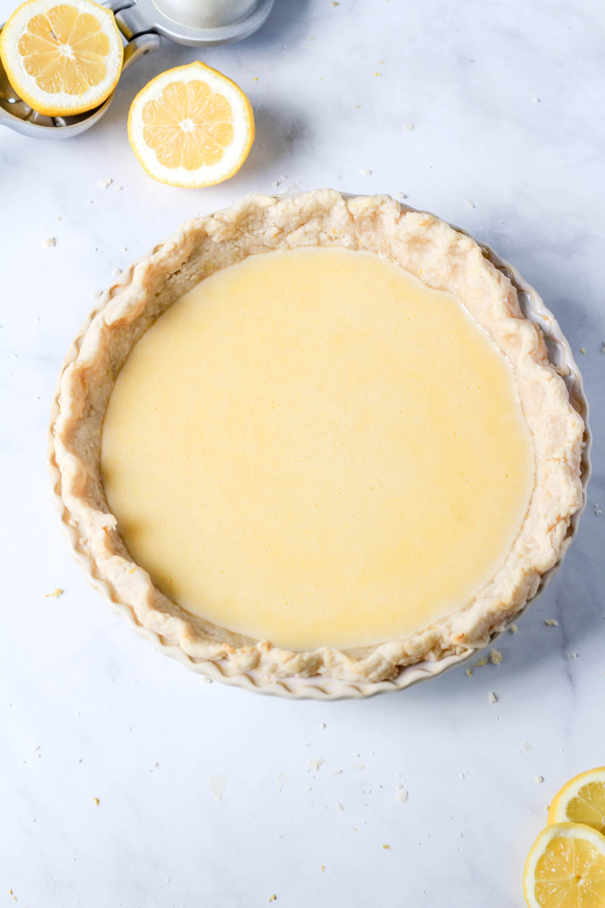 Lemon chess pie in a pie pan before baking.