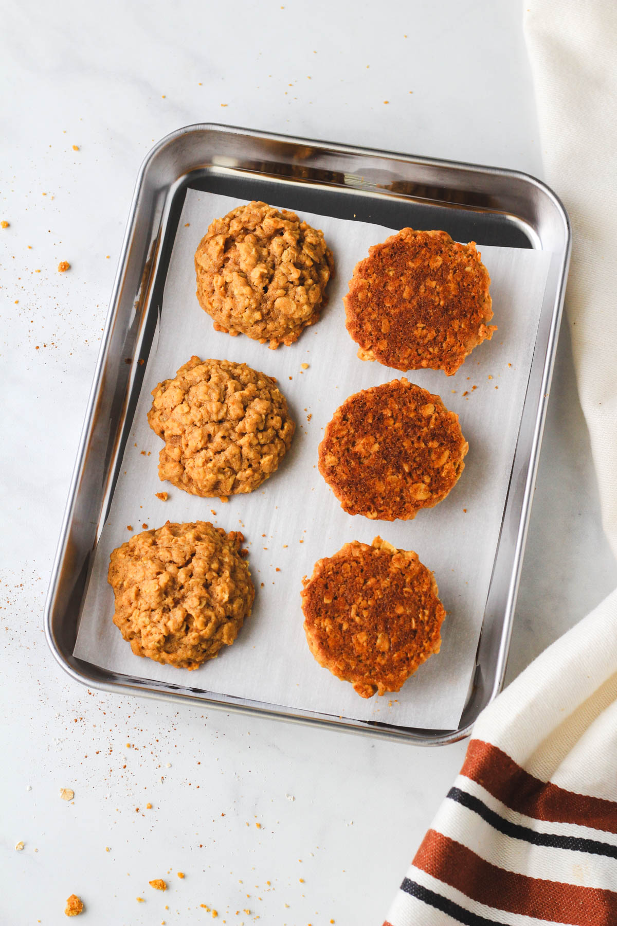 a small rimmed baking sheet with six dairy-free oatmeal cookies before adding the frosting.