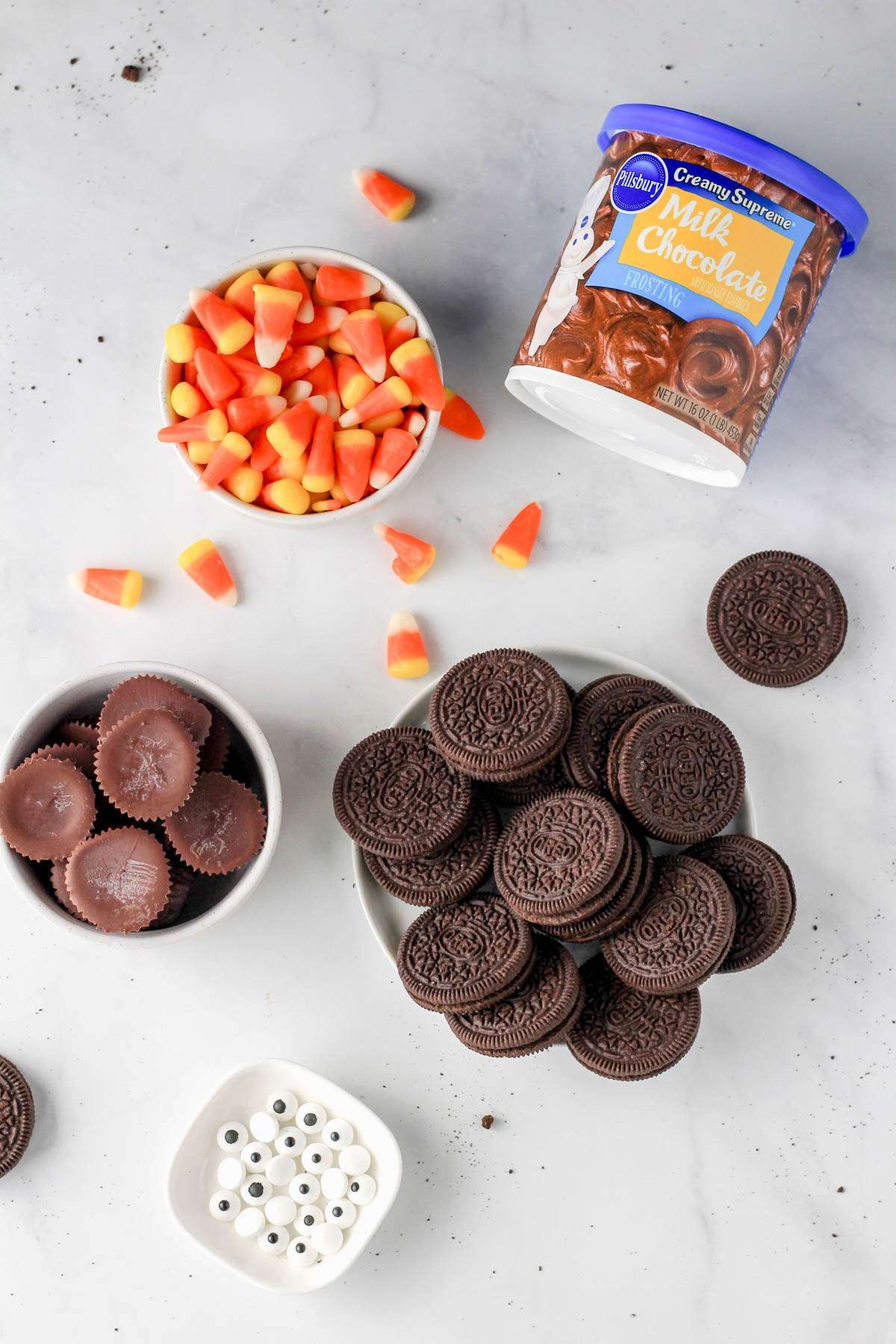 Ingredients for dairy-free Oreo turkey cookies on a white counter.