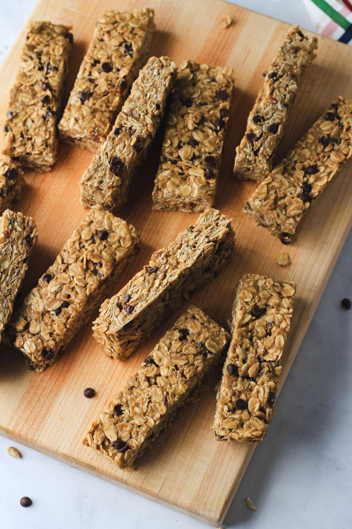Nut free granola bars on a wooden cutting board.