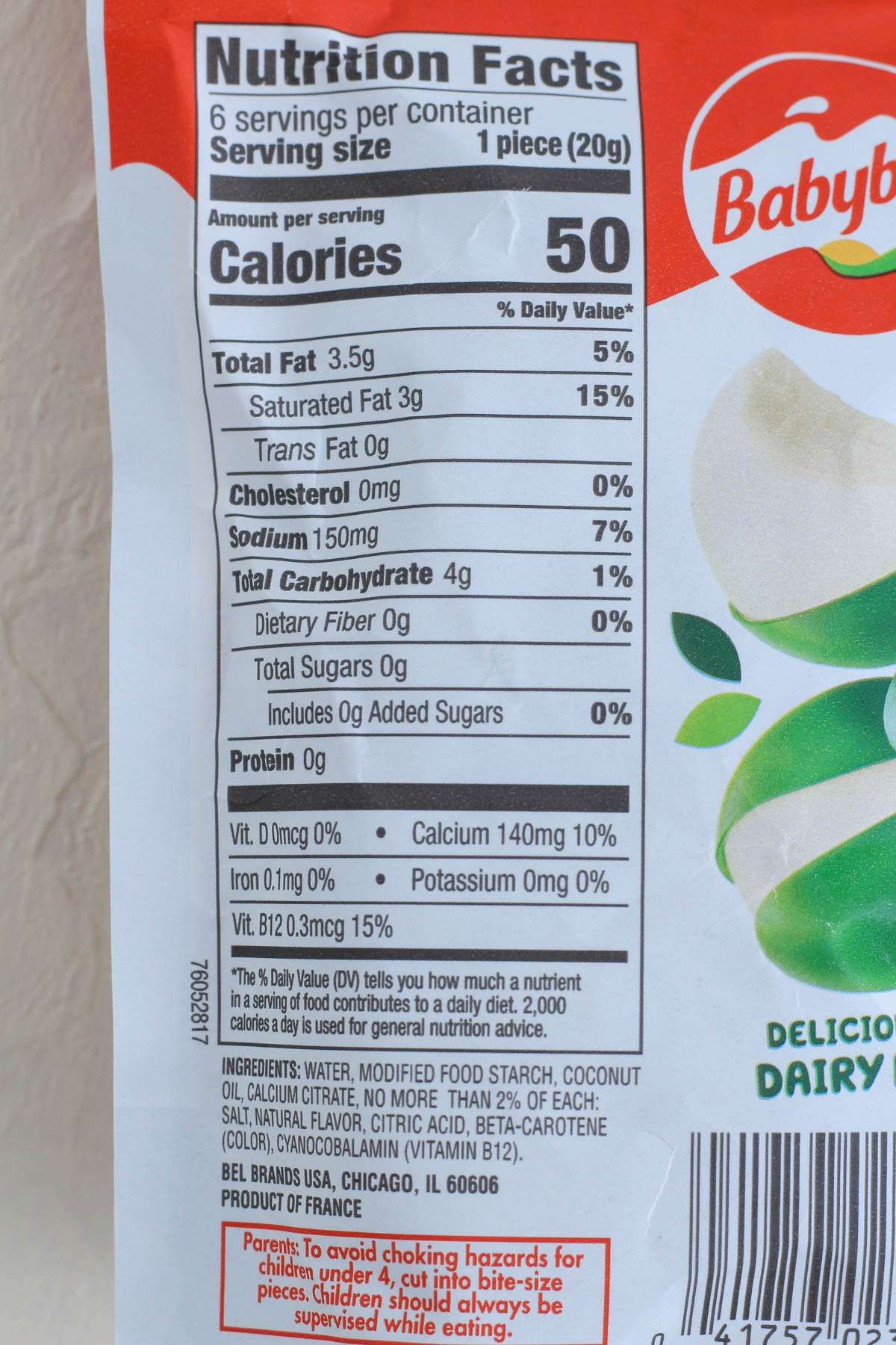 The back of the package of vegan babybel cheese showing the ingredients and nutritional information.