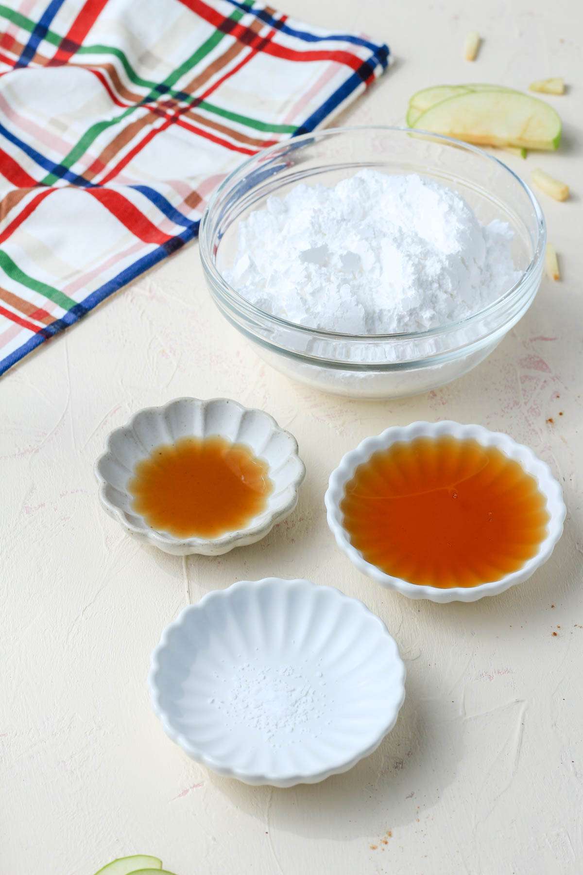 Ingredients for maple icing on a cream counter.
