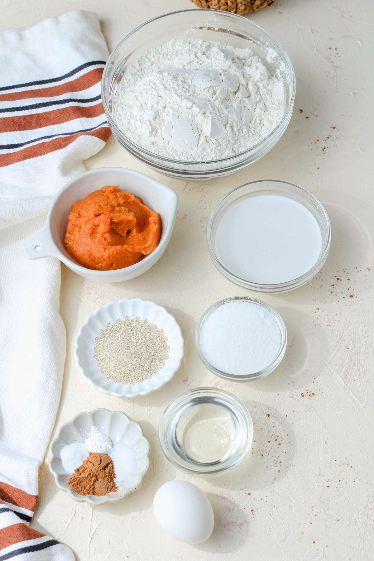 Ingredients for dairy-free pumpkin spice cinnamon rolls.