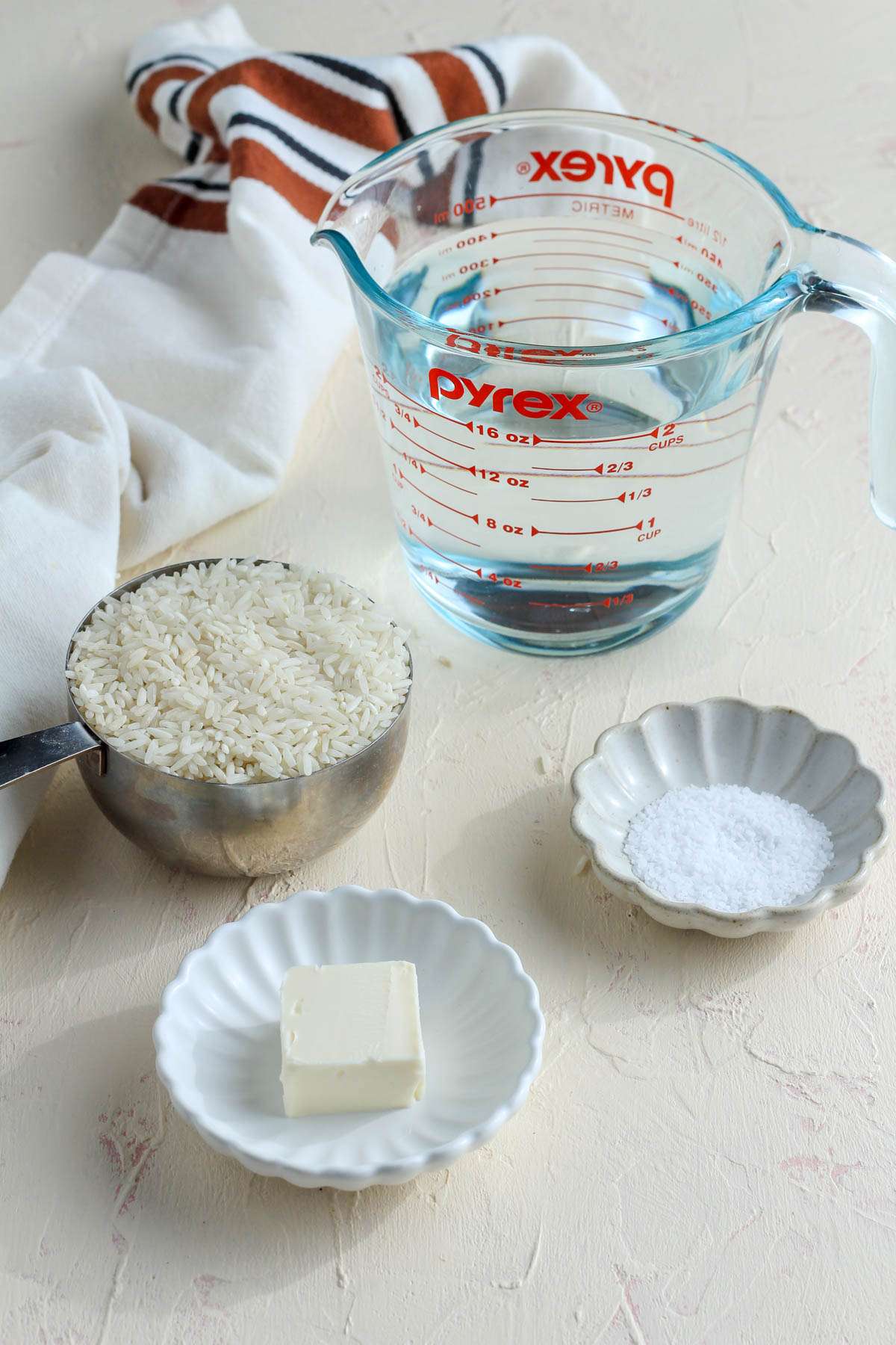Ingredients for cooking long grain rice.