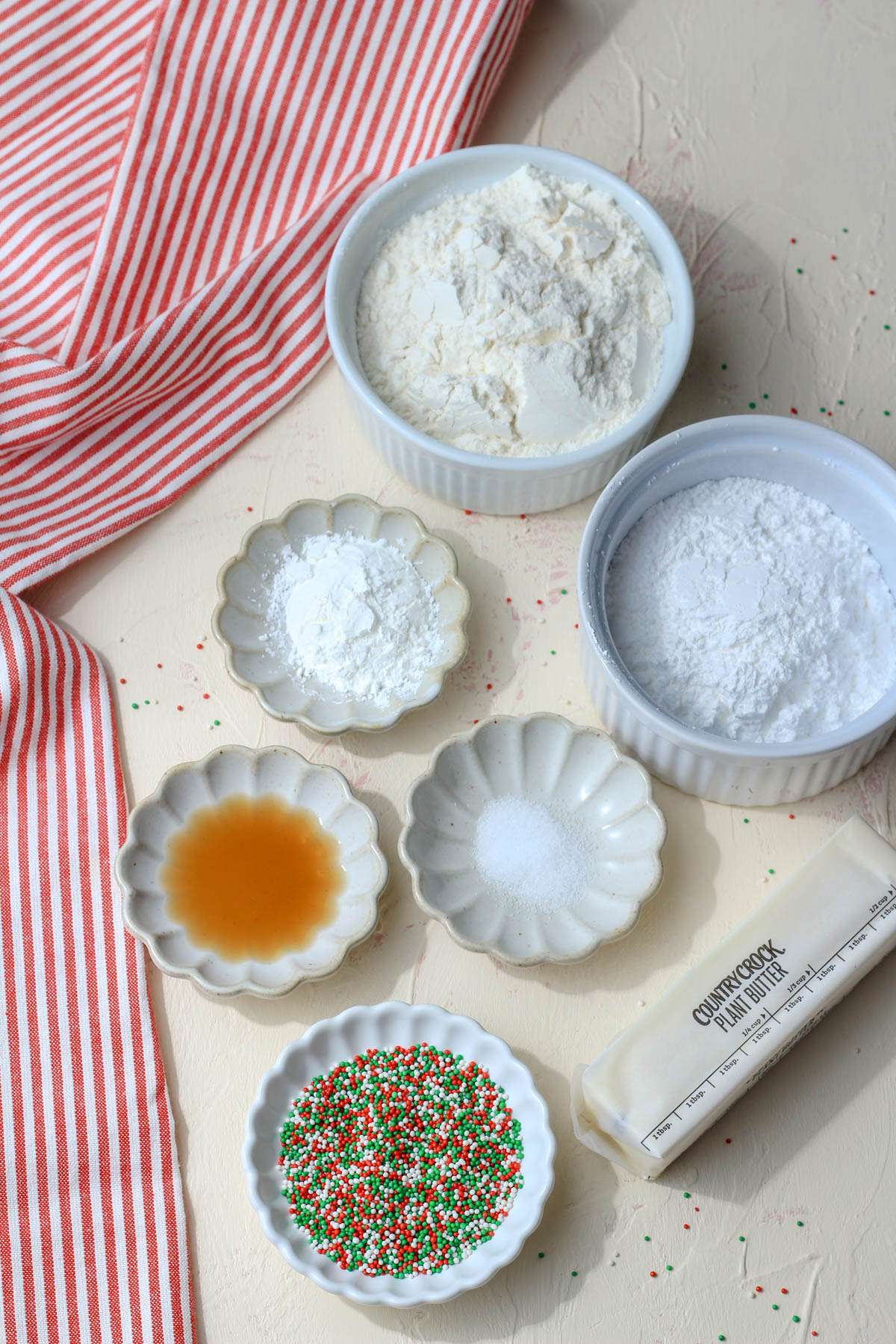 Ingredients for vegan whipped shortbread cookies on a counter.