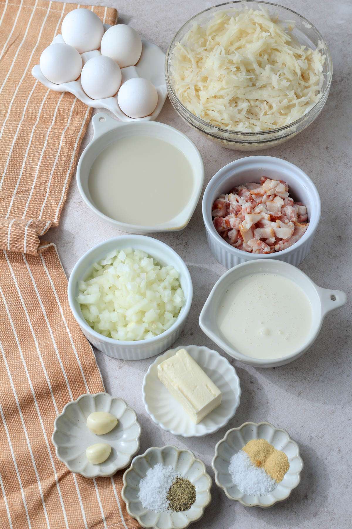 Ingredients for a dairy-free quiche with a hash brown crust.