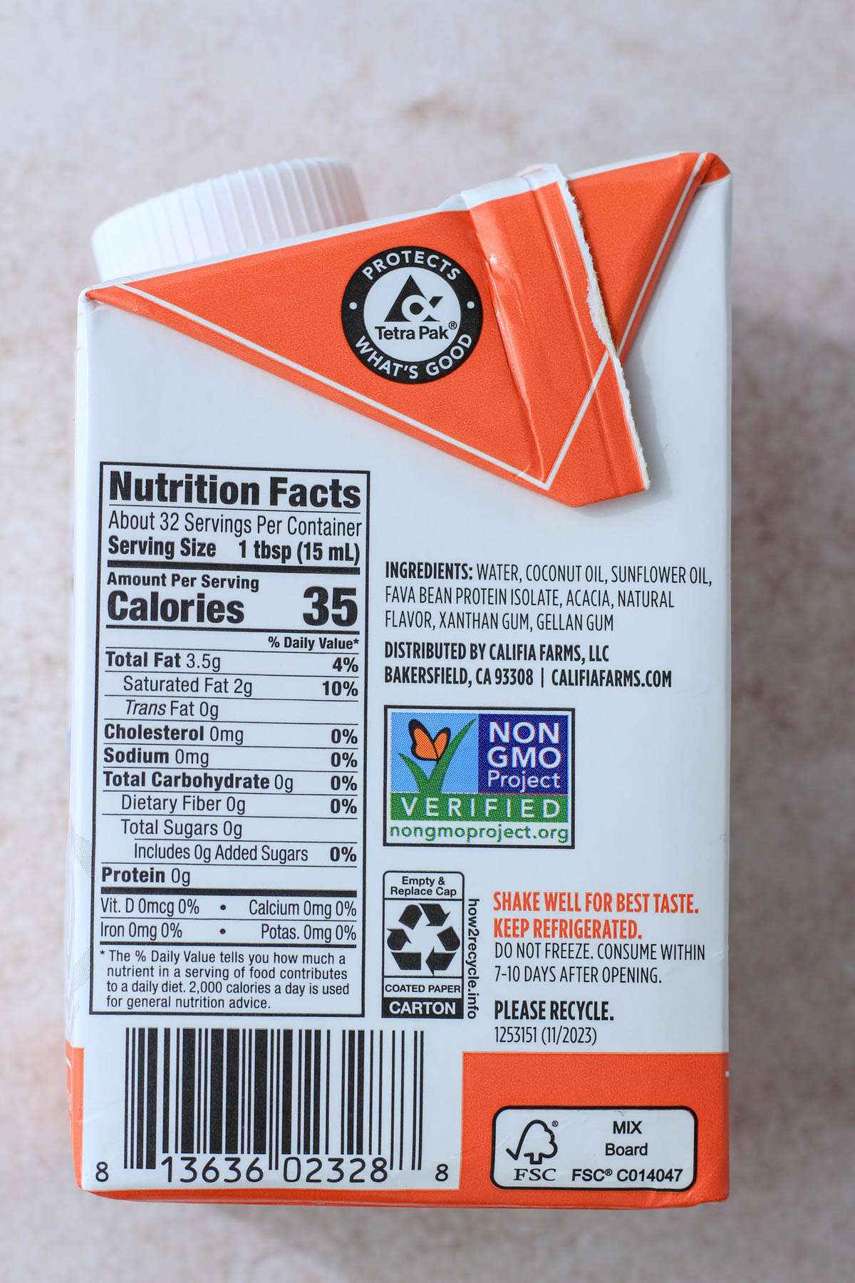A carton of Califia Farms Heavy Whip Substitute laying on the side to show the nutritional information.