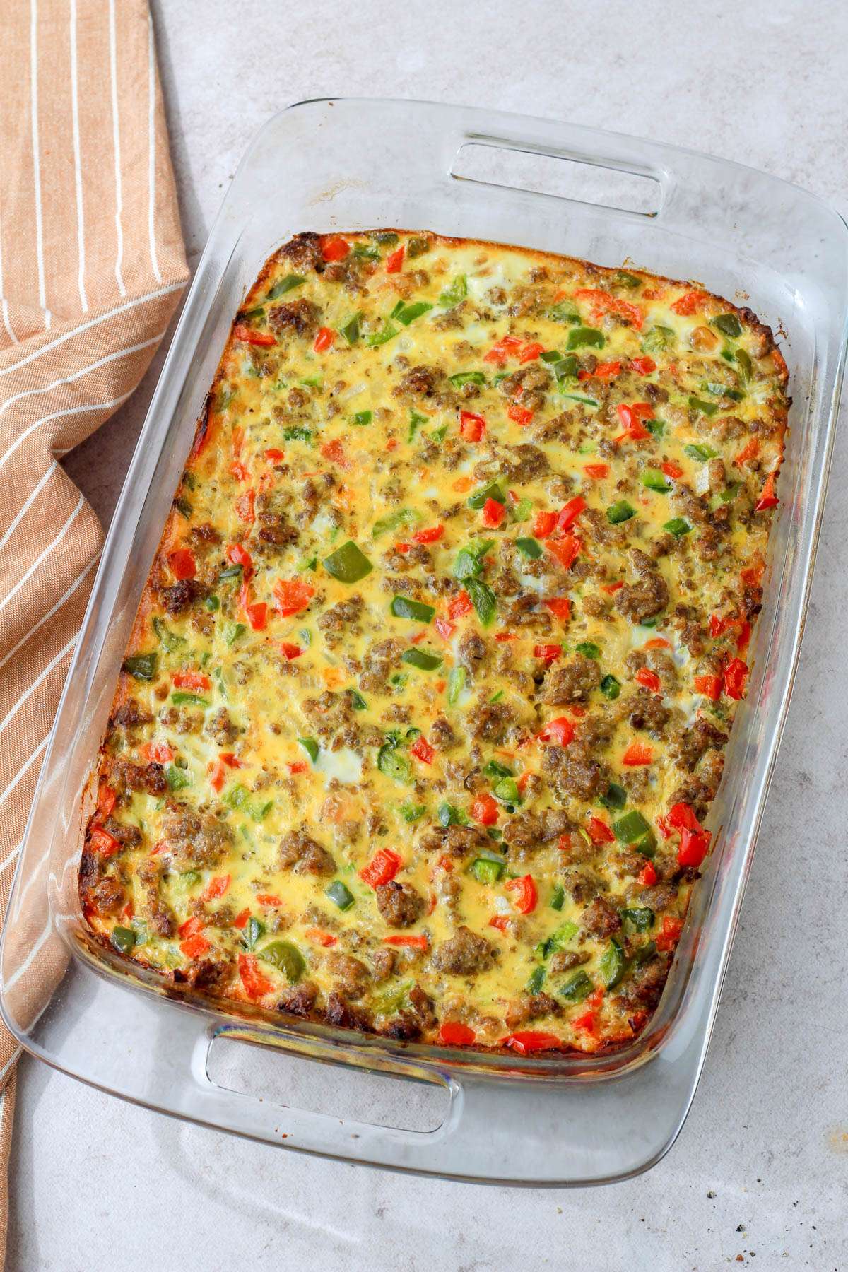 Dairy-free hashbrown casserole in a glass baking dish after baking.