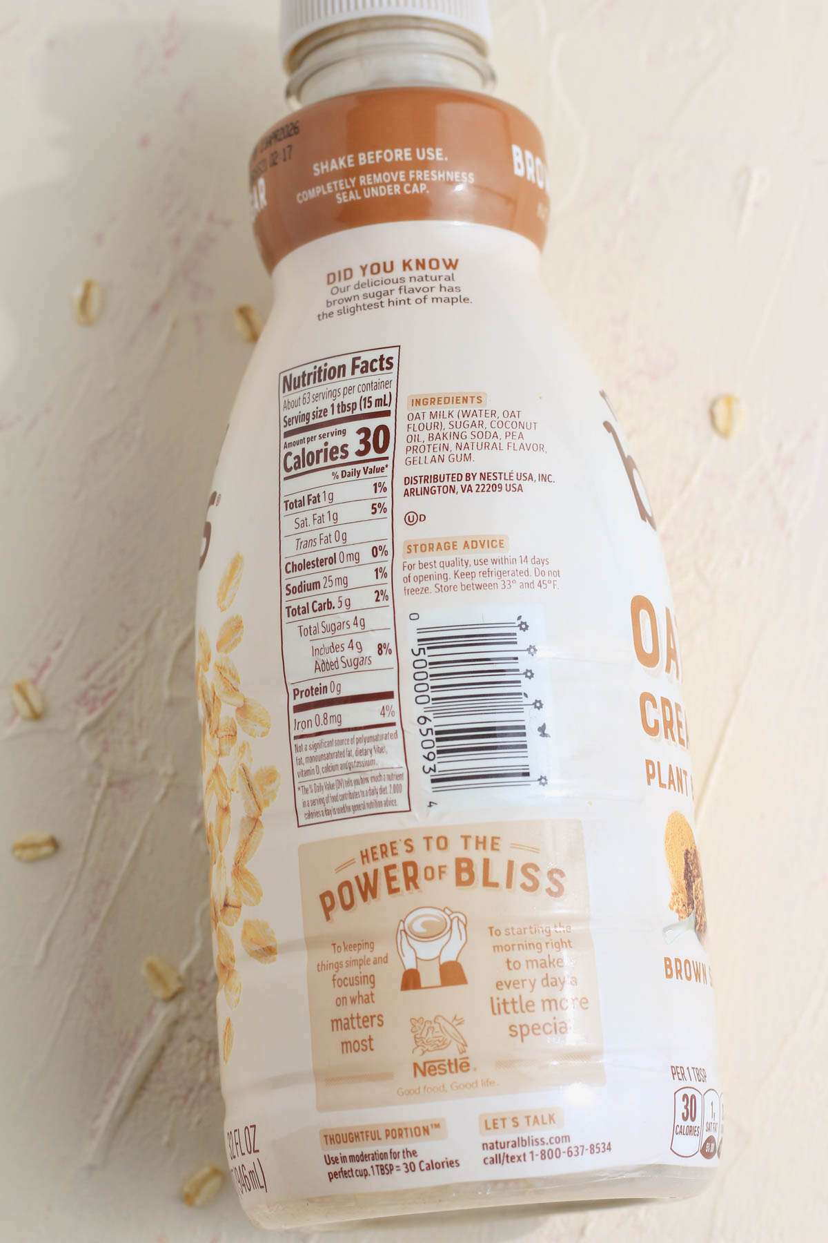 The nutritional label of a bottle of Natural Bliss coffee creamer.