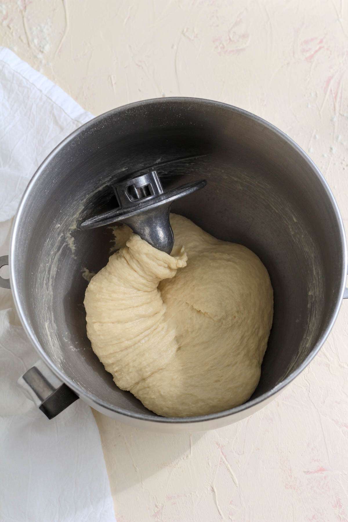 A ball of vegan bread dough after kneading for 8 minutes.